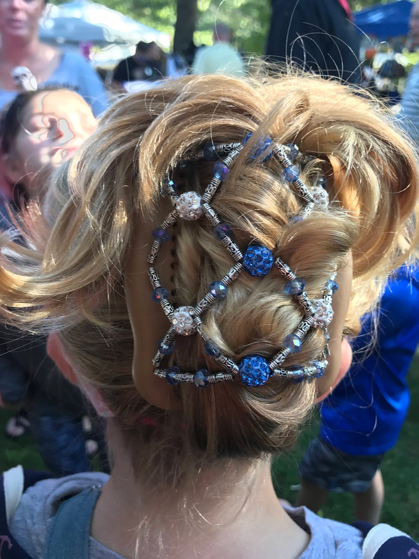 Decorative hair comb with blue crystals, double clip for fine and short hair, bun maker, pony tail holder, french twist holder all day.