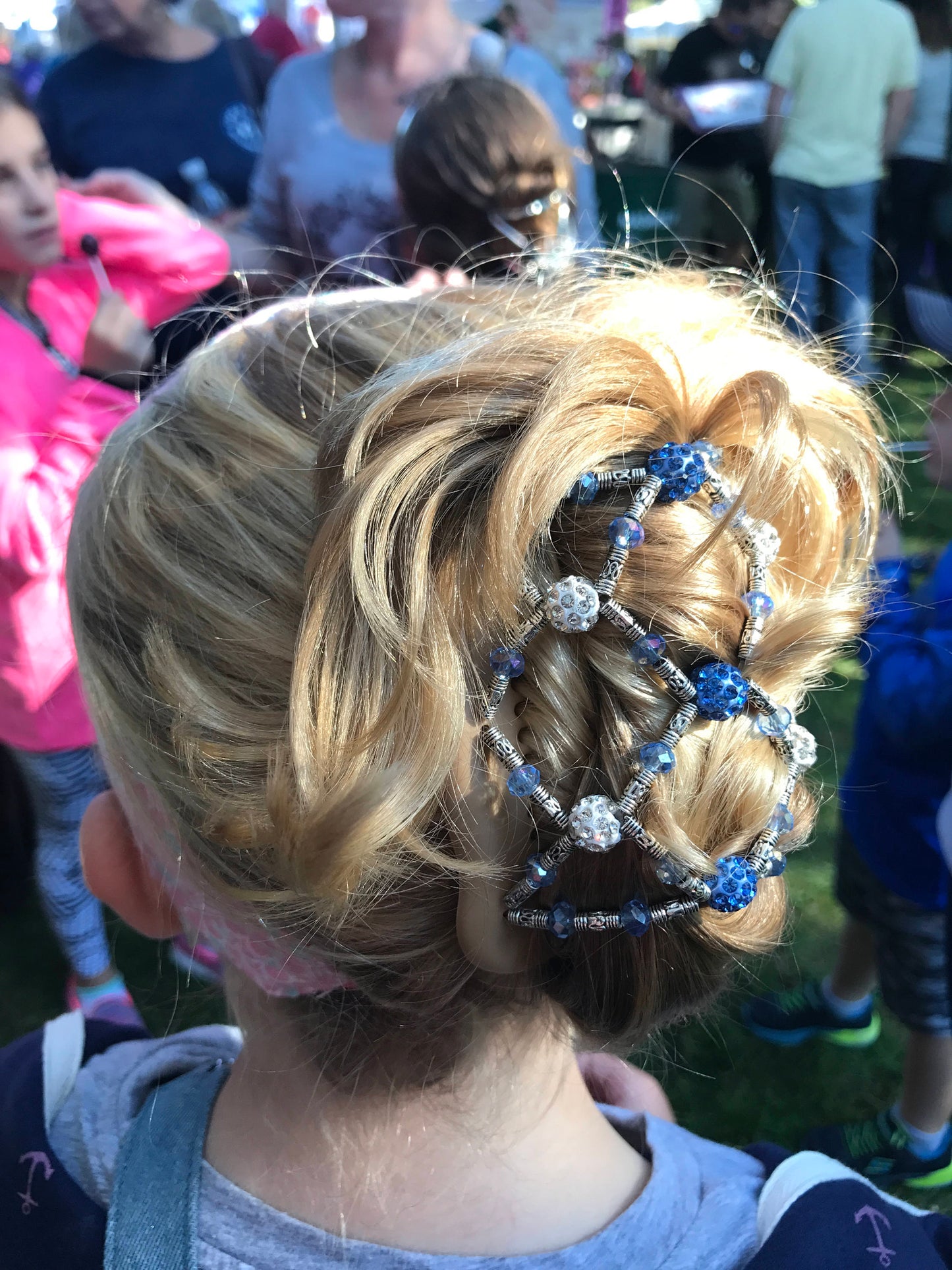 Decorative hair comb with blue crystals, double clip for fine and short hair, bun maker, pony tail holder, french twist holder all day.